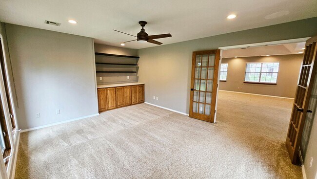 Building Photo - Inviting Home with Bonus Workshop Space!