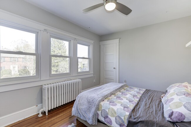 2nd bedroom on 2nd level has ceiling fan & lots of windows! - 4604 4th St S