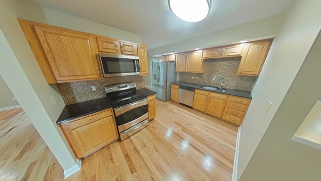 Building Photo - "Spacious 4-Bedroom Gem with 3 Full Baths ...