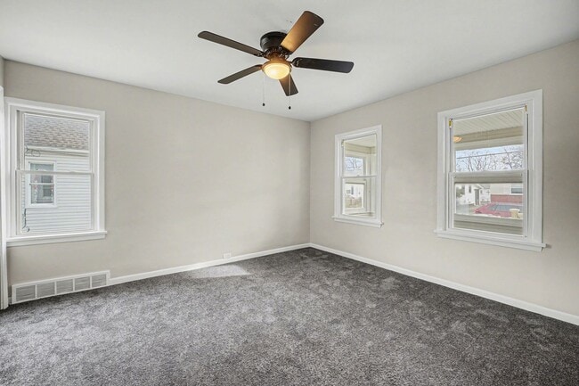 Building Photo - Updated First-Floor 2BR with Garage Parking and On-Site Laundry