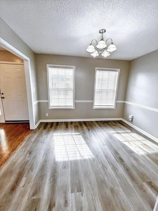 Building Photo - Spacious 3-Bedroom Home with Deck, Firepla...
