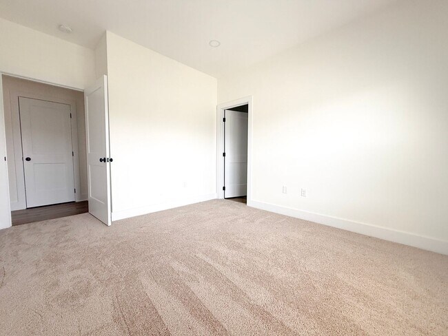 Building Photo - 3-Bedroom Home Steps from Resort-Style Pool with Jack-and-Jill Bath