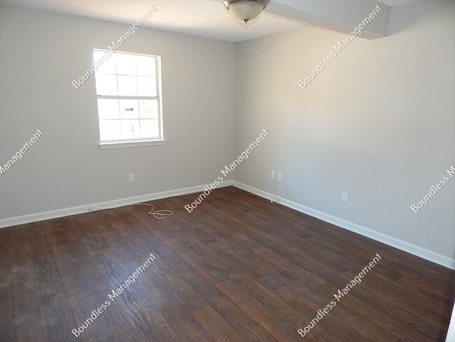 Building Photo - 7153 Woodland Cir