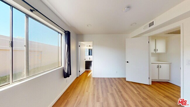 Building Photo - 10220 De Soto Ave
