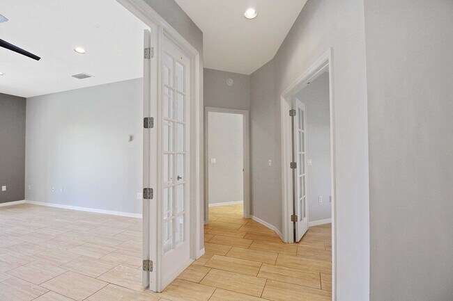 Building Photo - Annual rental: Spacious 3BR/2BA Creekwood Home with Office, Screened Lanai, EV Charger & Resort-S...