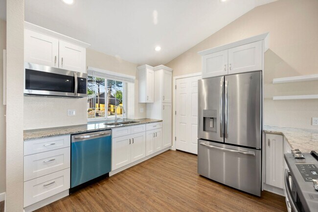 Building Photo - Spacious 3-Bedroom Home with 4th bedroom on lower level & Attached Garage
