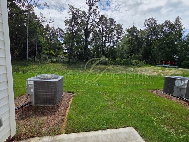 Building Photo - AVAILABLE SEPTEMBER 1! NEW CONSTRUCTION; 3...