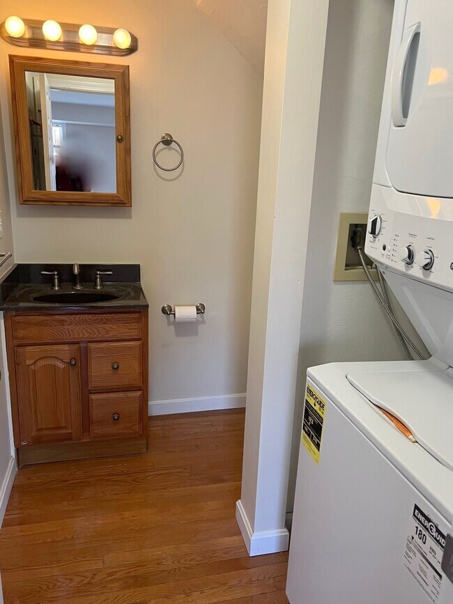 Half bath with laundry - 360 Littleton Rd