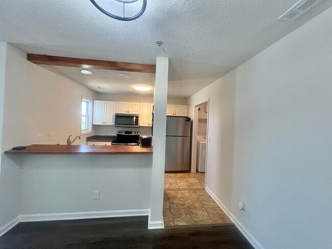 Building Photo - RENT SPECIAL! Freshly Painted! New Luxury ...