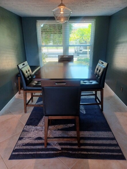Building Photo - UPGRADED WATERFRONT END UNIT 3 BR / 2 BA Home With BOAT LIFT/ DOCK & OUTSTANDING VIEWS