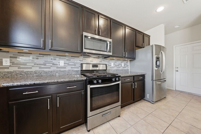 Building Photo - Mountains Edge Gem with Loft, Den & Upgraded Kitchen