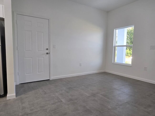 Building Photo - Brand-New 2/2/1 -SW Lehigh Acres-See this ...