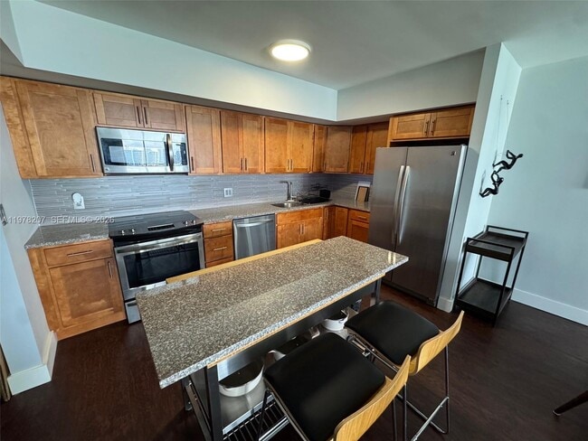 Building Photo - 19380 Collins Ave