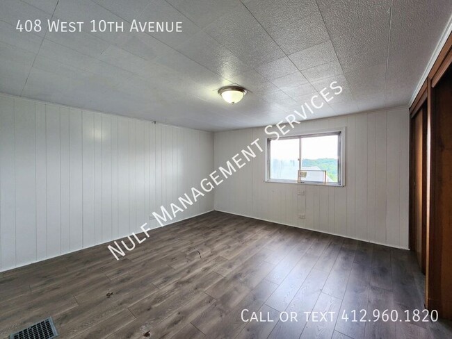 Building Photo - 408 W 10th Ave