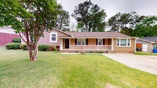 Building Photo - 3 Bedroom with 2 Living Rooms & finished b...