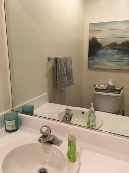 Half bath between living room and kitchen. - 515 School Ln