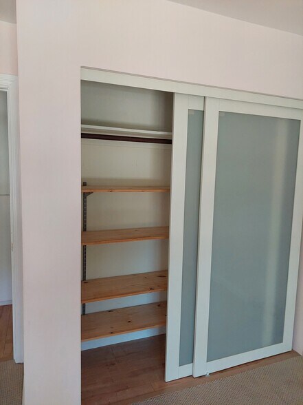 Bedroom closet with removable shelves - 5600 Kensington Way