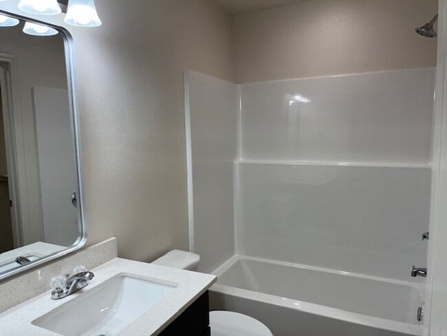 Building Photo - Introducing a newly constructed 3-bedroom, 2-bathroom house in the desirable location of Russellv...