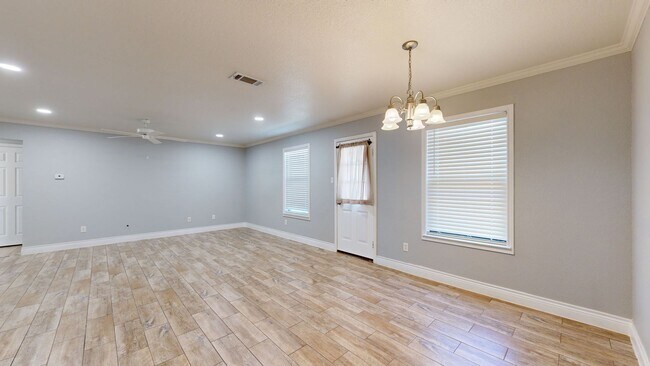 Building Photo - Completely repainted 4 bedroom ALL TILE ho...