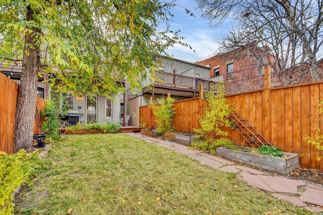 Building Photo - Architecturally Stunning Curtis Park Townhome With Historic Charm