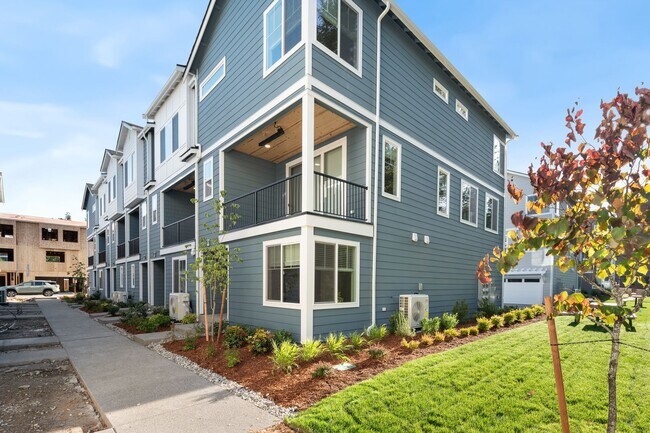 Building Photo - NEW CONSTRUCTION – Stylish 4-Bedroom Townh...