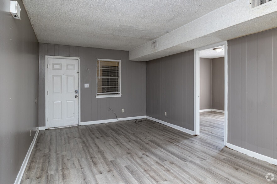 2BR, 1BA - 854SF - Living Room - Sunset Village