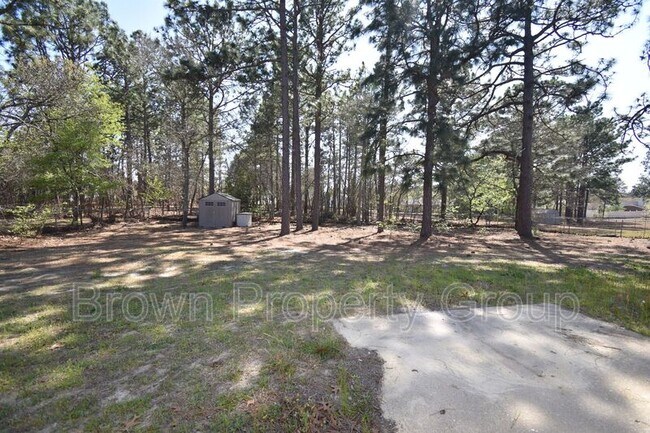 Building Photo - 6901 Woodmark Dr