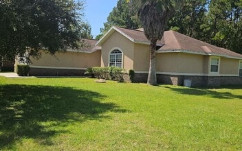 Building Photo - 885 SW Jaguar Dr