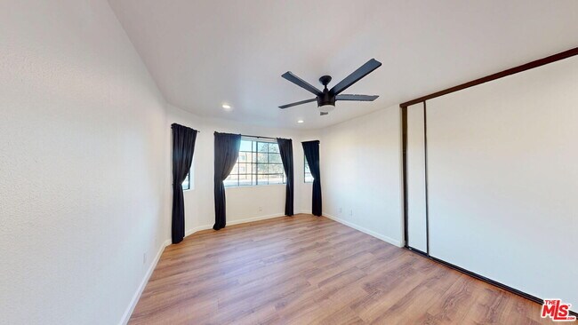 Building Photo - 10220 De Soto Ave