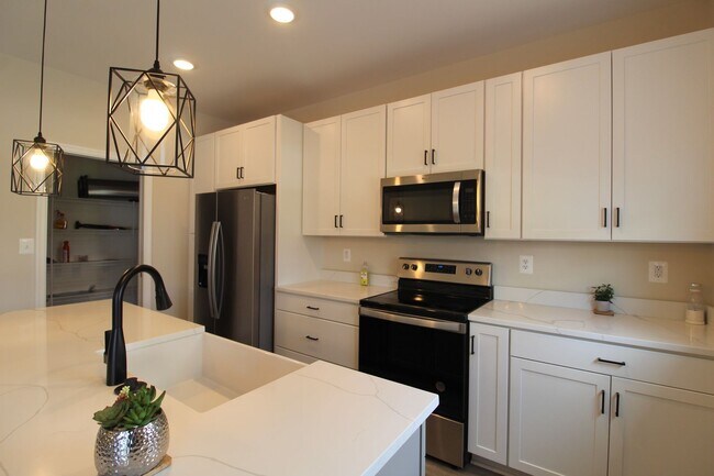 Building Photo - New construction 4 bed 3.5 bath townhome!