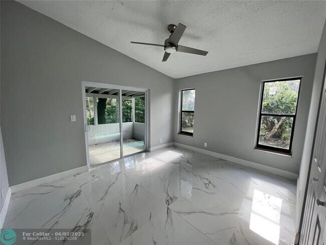 Building Photo - 4371 NW 80th Ave