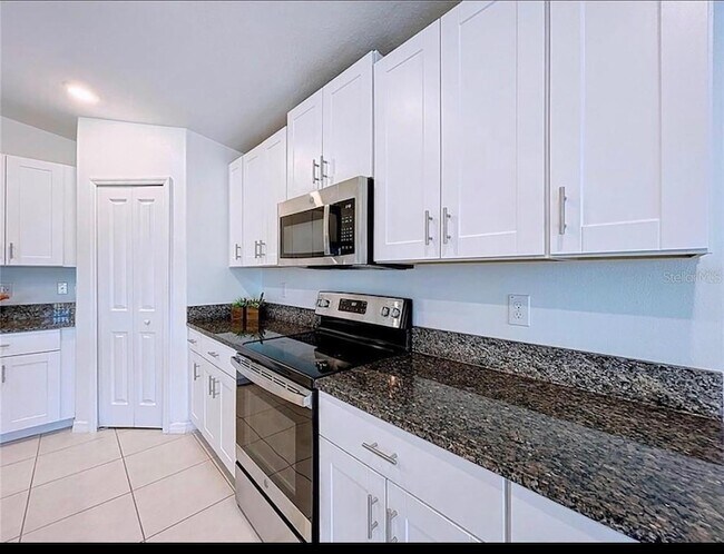 Building Photo - 6557 Bar S Bar Trl