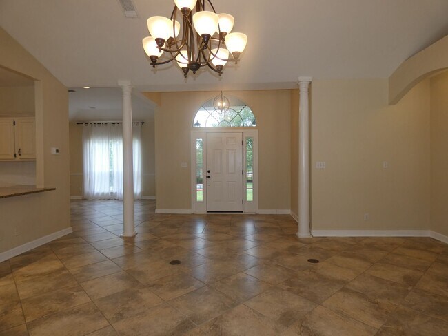 Building Photo - Spacious 4-Bedroom Pool Home