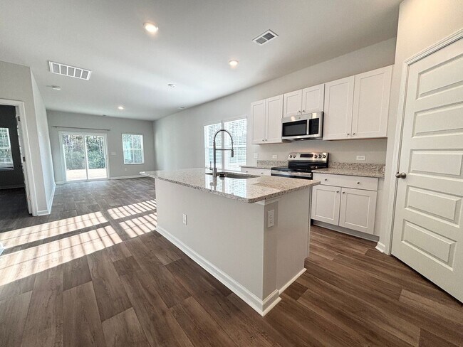 Building Photo - ABSOLUTELY BEAUTIFUL BRAND-NEW BUILD TOWNHOME