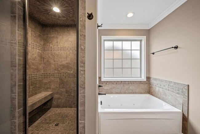 Building Photo - Four Bedroom with Three Car Garage!