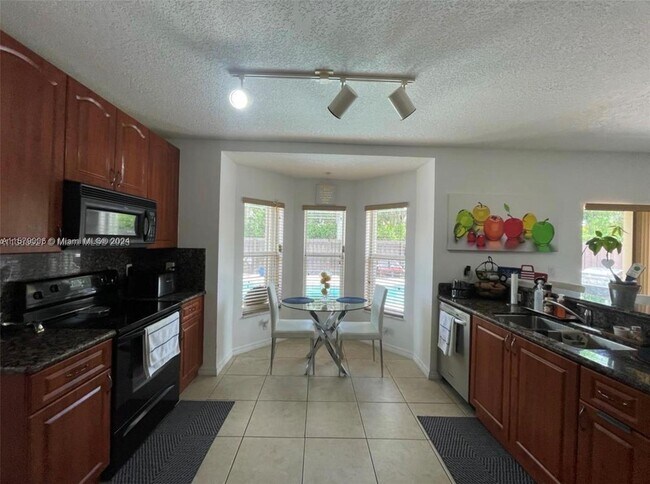 Building Photo - 1975 NE 36th Ave