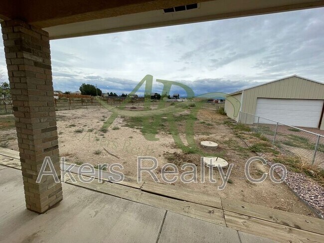 Building Photo - 965 N Cimarron Dr