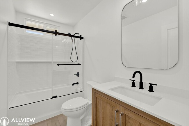 Building Photo - Fully Renovated 4-Bedroom Home with Firepl...