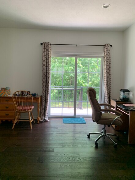 First Level rear view - 304 Thurgood Dr