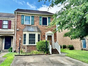 Building Photo - Updated End-Unit Brick Townhome Ready NOW!...