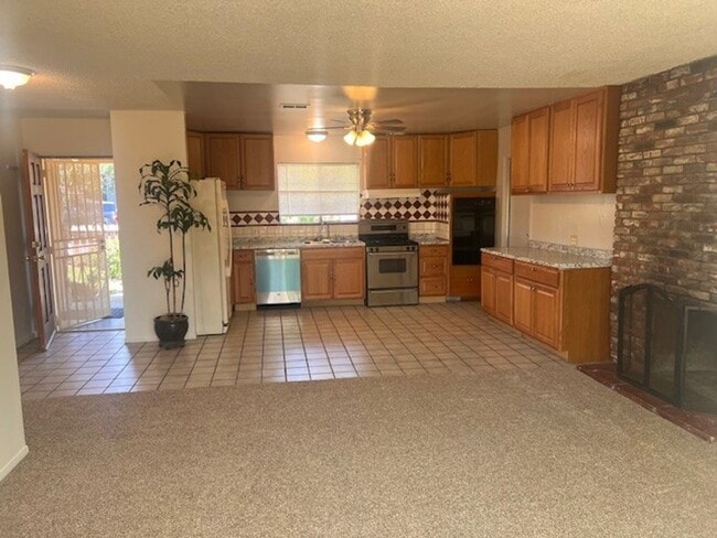 Building Photo - Charming Home with Expansive Yard, Fruit Trees & RV Parking