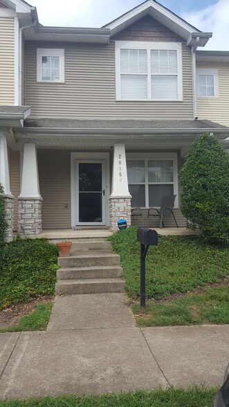 Covered front porch with nice roll up screen door. - 2015B Beech Avenue