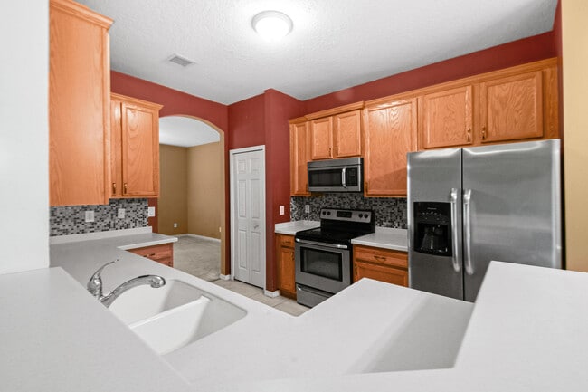Building Photo - 6221 NW Hacienda Ln