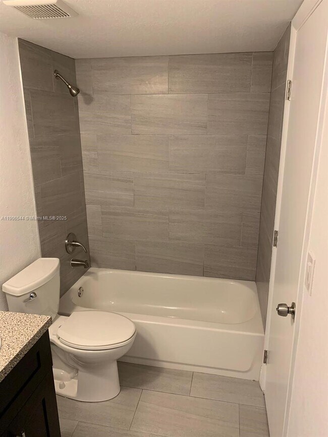 Building Photo - 11635 Royal Palm Blvd