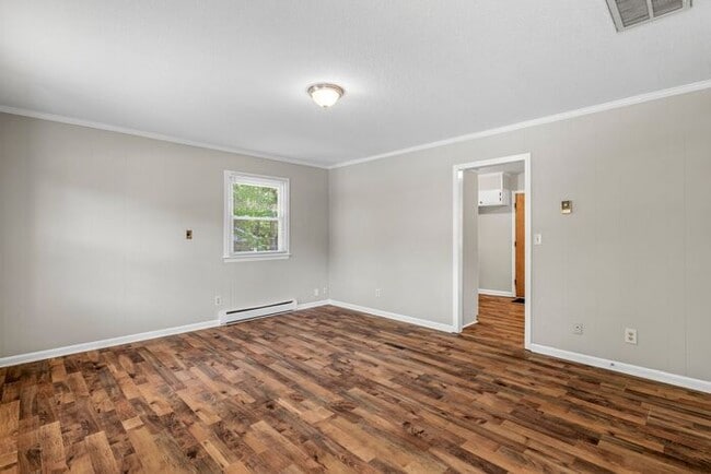 Building Photo - Large Home in Four Seasons Area, Hardwoods, Dining Room, Screed Porch, Fenced!