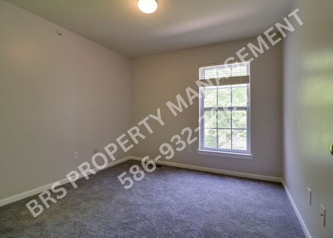 Building Photo - Move-In Ready 2BR Condo with Covered Garage in Harrison Township