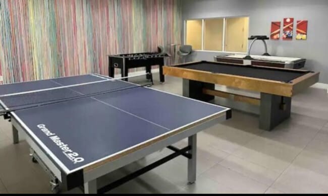 Recreation room with pool table and ping-pong table - 1200 Brickell Bay Dr
