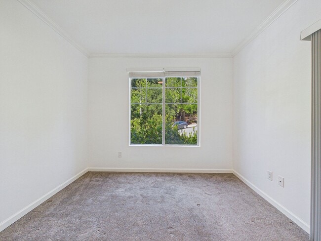 Building Photo - Stylish & Updated 1BD/1BA Condo in Secure Caldecott Community – Parking + In-Unit Laundry