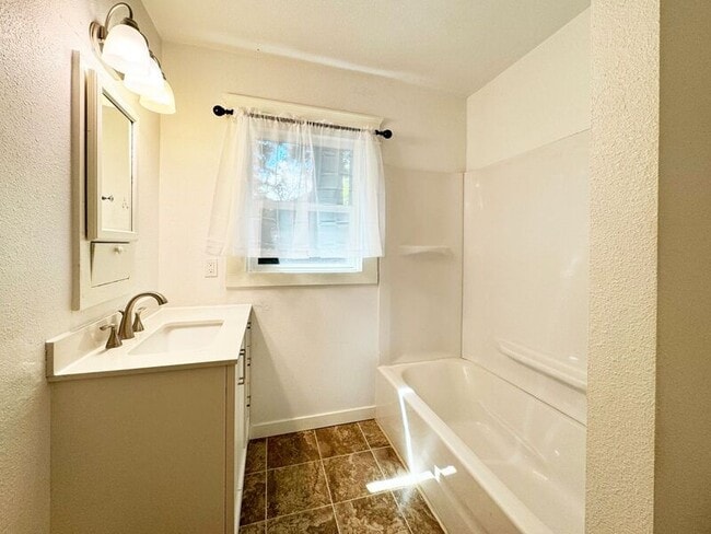 Building Photo - 1100 W 4th Ave