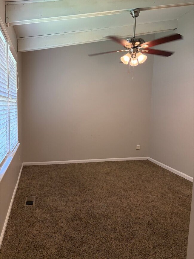 Building Photo - Move-In Ready 4BR/3BA Home with Spacious Layout & Large Yard